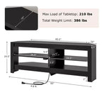 Mueble esquinero para TV de 3 niveles con toma de corriente y 4 estantes abiertos, para televisores de hasta 65 pulgadas